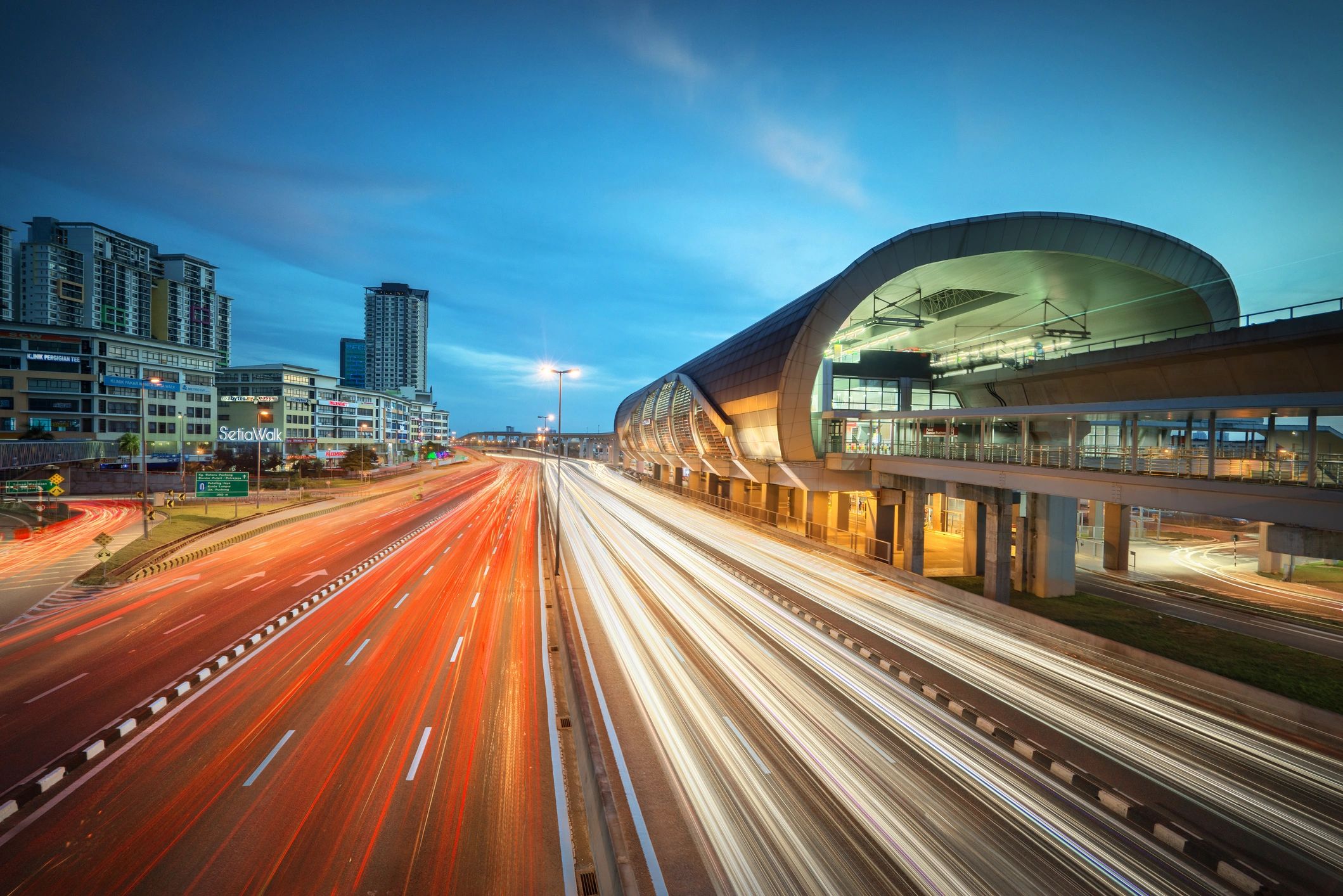 City lights at night representing flexible evening transportation